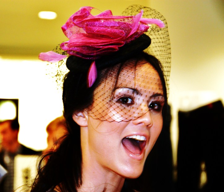 Modeling local designer Phuong May's vintage-inspired topper.